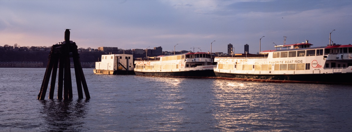 Boats on the Hudson at sunset